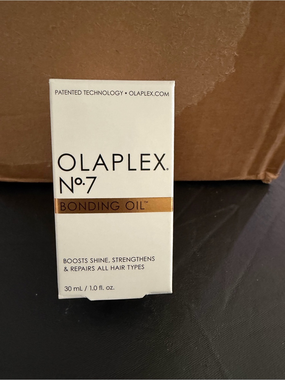 OLAPLEX No.7 Bonding Oil — Clear Bottle with Golden Yellow Oil